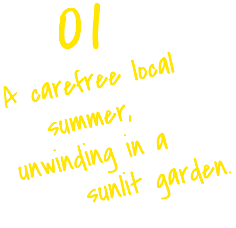 A carefree local summer, unwinding in a sunlit garden.