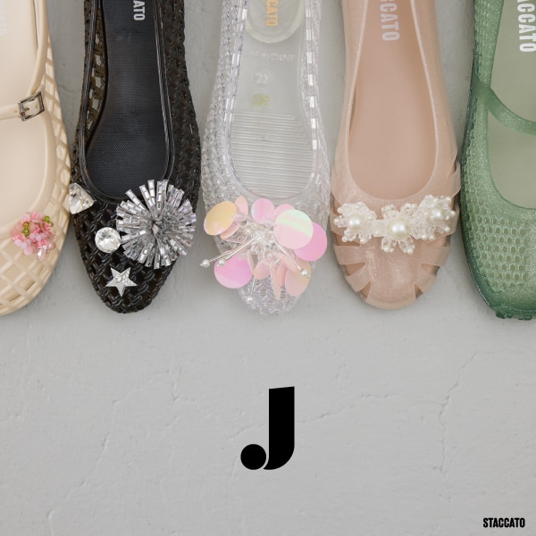 J.